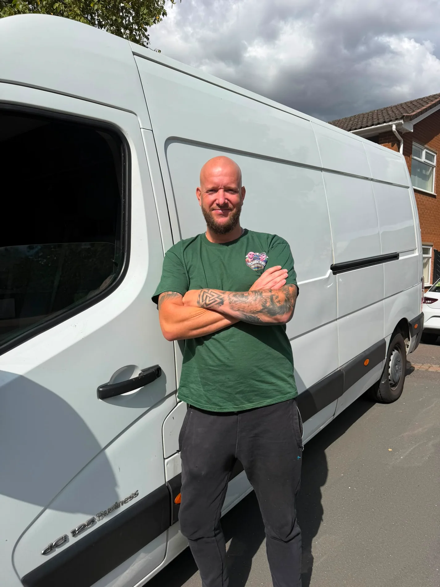 Karl from Hobberry Deliveries and Removals standing beside the van